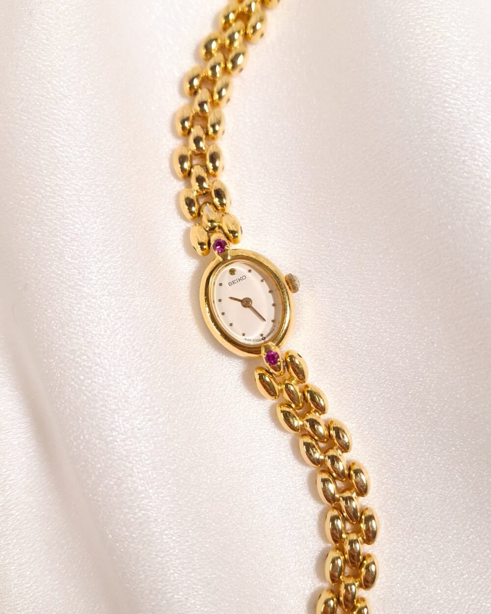 Seiko Ruby Accent Oval Bracelet Watch